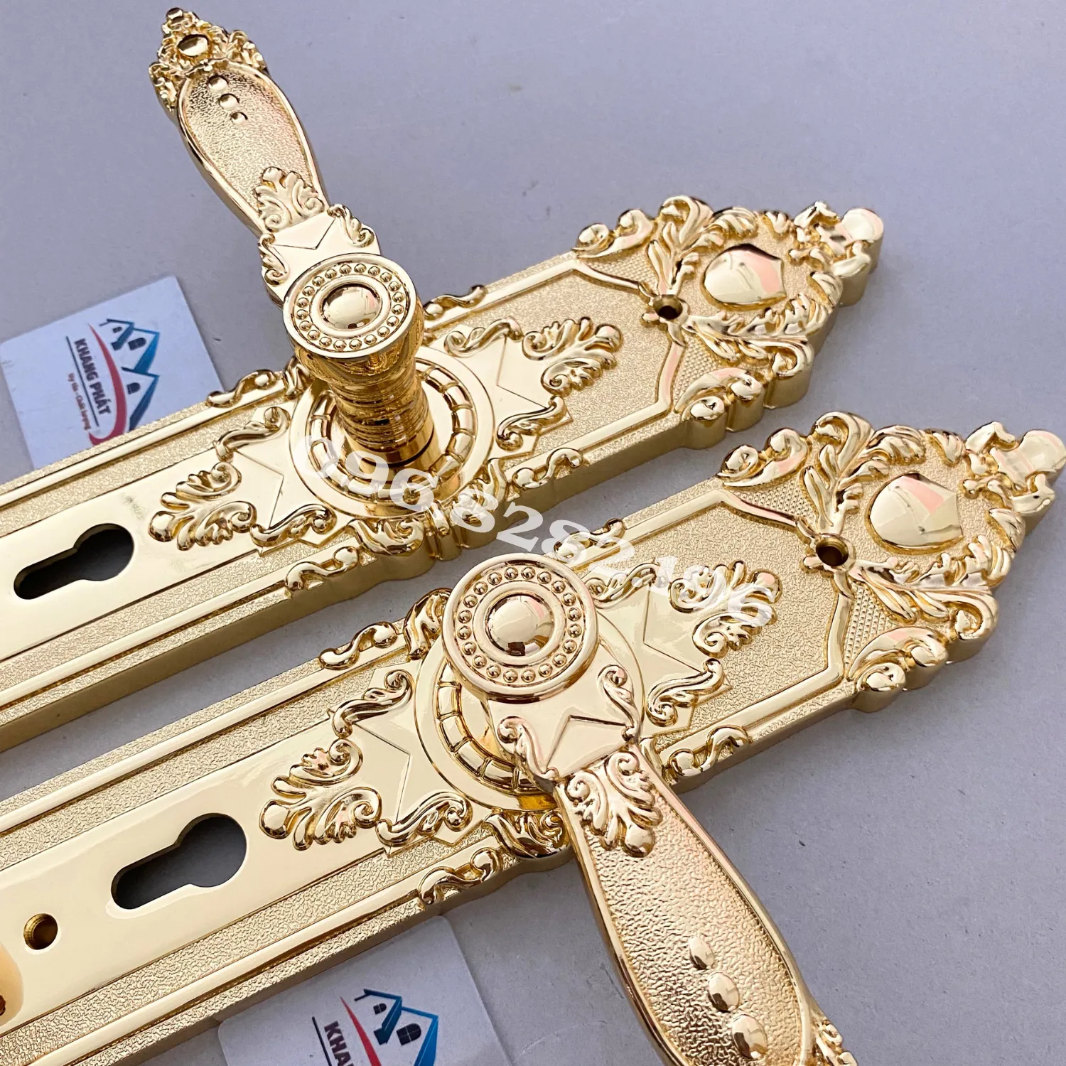 hoa văn tay gạt và mặt ốp khóa đồng